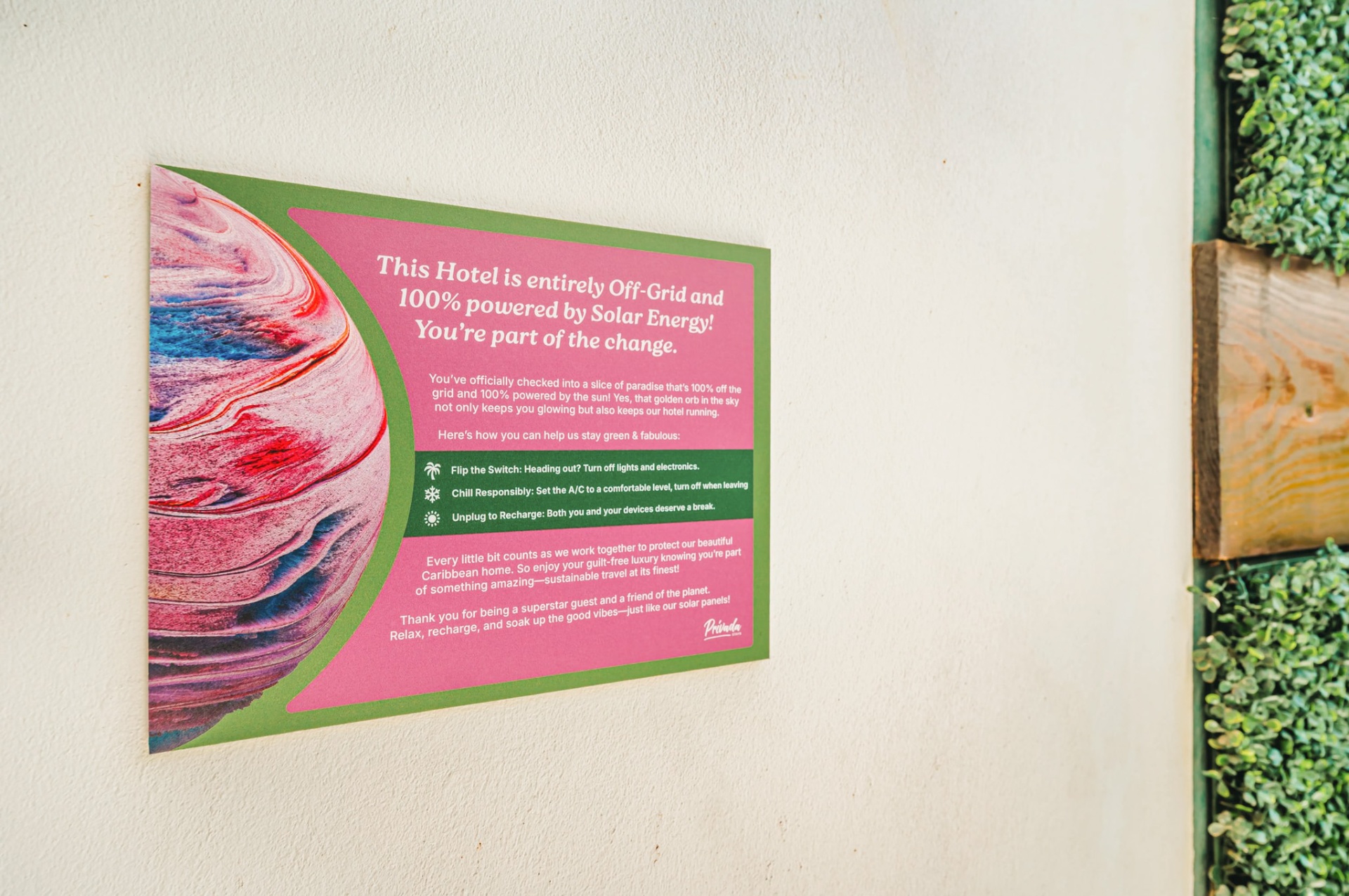 In-room sign explaining the hotel is off-grid and 100% solar powered
